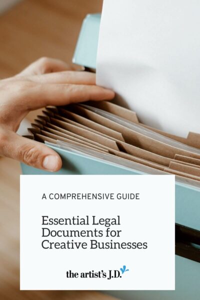 Sage green file folder with the text, A Comprehensive Guide: Essential Legal Documents for Creative Businesses
